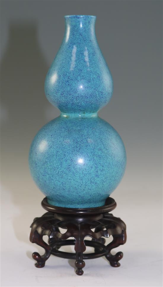 A Chinese robins egg glazed double gourd vase, late 18th century, 15.5cm, wood stand